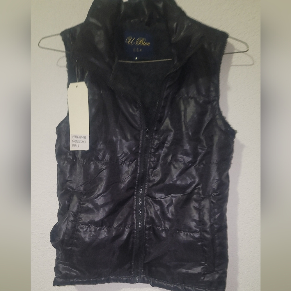 NWT black vest youth size medium
